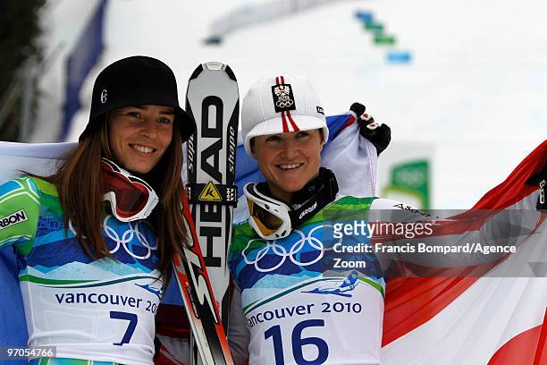 Tina Maze of Slovenia takes the Silver Medal and Elisabeth Goergl of Austria takes the Bronze Medal during the Women's Alpine Skiing Giant Slalom on...
