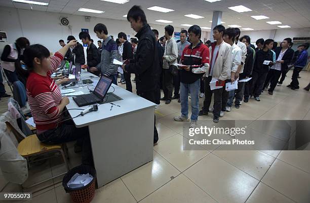 Migrant workers enroll in the Foxconn Factory on February 24, 2010 in Shenzhen of Guangdong Province, China. Quanshun Human Resources Co, a major...