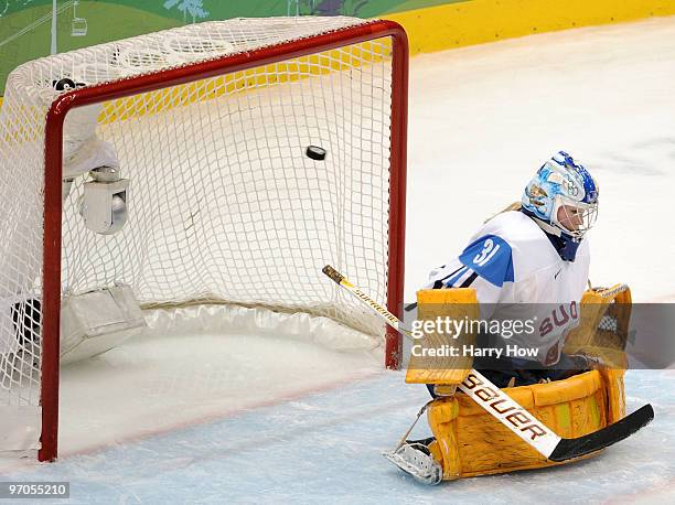 Noora Raty of Finland concedes a goal to Maria Rooth of Sweden during the ice hockey women's bronze medal game between Finland and Sweden on day 14...