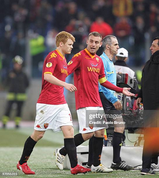 John Arne Riise and Daniele De Rossi of AS Roma leaves the field at the end of the UEFA Europa League Round of 32, 2nd leg match between AS Roma and...