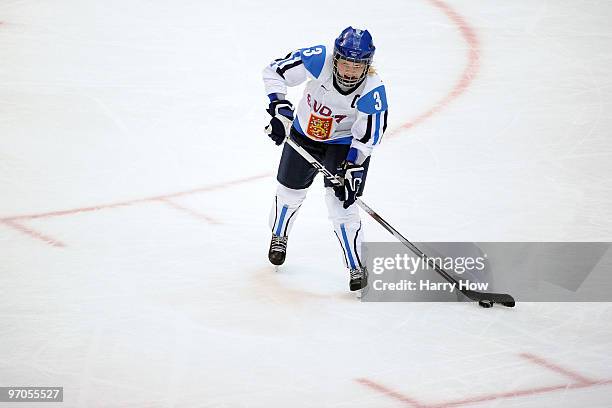 Emma Laaksonen of Finland controls the puck during the ice hockey women's bronze medal game between Finland and Sweden on day 14 of the Vancouver...