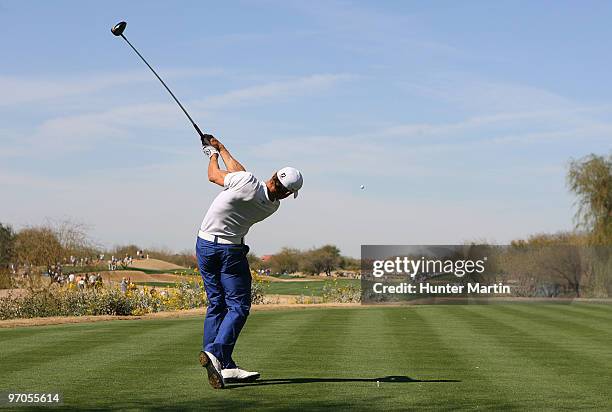 Camilo Villegas of Colombia hits his tee shot on the 3rd hole during the first round of the Waste Management Phoenix Open at TPC Scottsdale on...