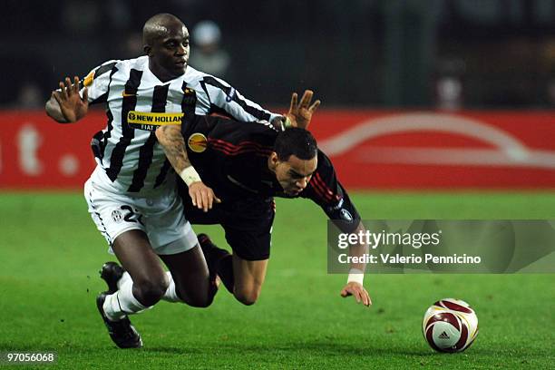 Mohamed Lamine Sissoko of Juventus clashes with Gregory van der Wiel of Ajax during the UEFA Europa League Round 32 second leg match between Juventus...