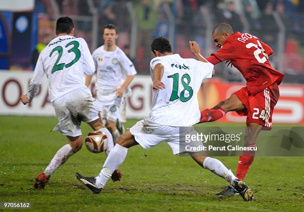 David Ngog of Liverpool kicks the ball during the UEFA Europa League, Round of 32, 2nd leg match between FC Unirea Urziceni and Liverpool at the...