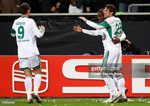 Grafite of Wolfsburg celebrates with his team mates after scoring his team's 4th goal during the UEFA Europa League knock-out round, second leg match...