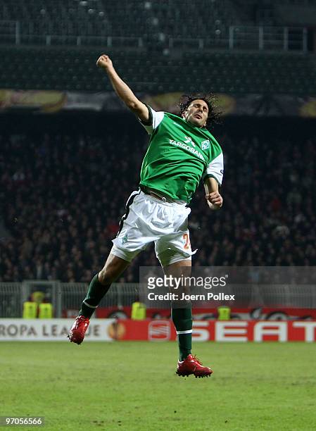 Claudio Pizarro of Bremen celebrates after scoring his team's fourth goal during the UEFA Europa League knock-out round, second leg match between SV...