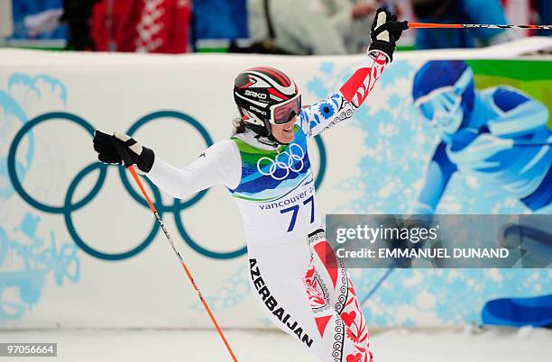 Azerbaijan's Gaia Bassani Antivari reacts in the finish area during the women's giant slalom race of the Vancouver 2010 Winter Olympics at the...