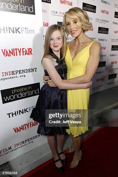 Actresses Elle Fanning and Felicity Huffman arrive to the Film Independant screening of "Phoebe In Wonderland" held at the WGA Theatre on March 1,...