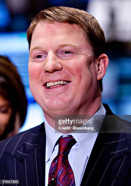 Paul Amos, president and chief operating officer of Aflac Inc., smiles during a television interview on the floor of the New York Stock Exchange in...