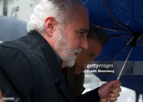 Daniel Bonventre, former operations chief for Bernard M. Madoff, left, leaves federal court following a hearing in New York, U.S., on Thursday, Feb....