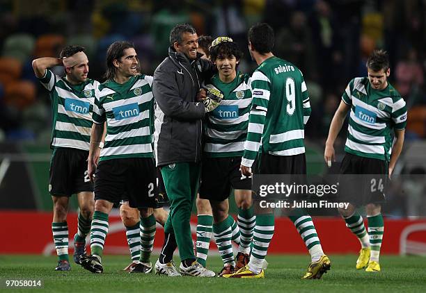 Matias Fernandez of Sporting is congratulated after scoring the third goal at full time during the UEFA Europa League Round of 32, 2nd leg match...