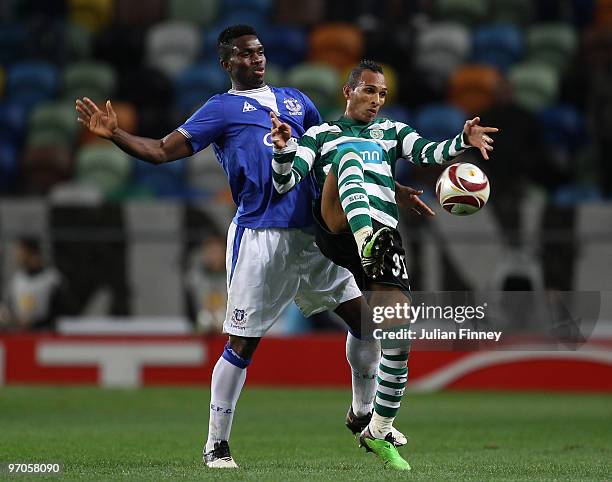 Liedson of Sporting battles with Joseph Yobo of Everton during the UEFA Europa League Round of 32, 2nd leg match between Sporting Lisbon and Everton...