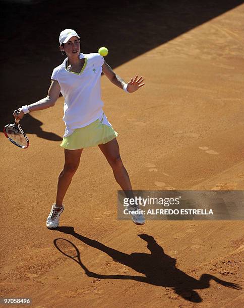 Spanish tennis player Carla Suarez returns the ball to Argentinian tennis player Gisal Dulko, during the fourth day of the WTA Open in Acapulco,...