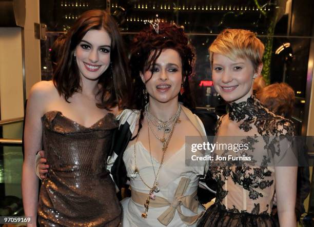 Actresses Anne Hathaway, Helena Bonham Carter and actress Mia Wasikowska attend the Royal World Premiere of Tim Burton's 'Alice In Wonderland' at the...