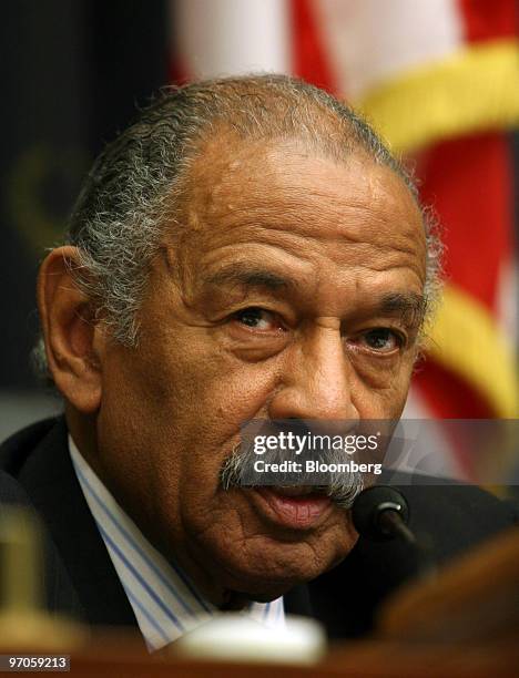Representative John Conyers, a Democrat from Michigan chairs a hearing by the House Judiciary Committee on the proposed takeover of NBC Universal by...