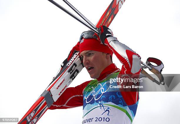 Bill Demong of the United States celebrates winning the gold medal in the Nordic Combined Individual LH/10 km on day 14 of the 2010 Vancouver Winter...