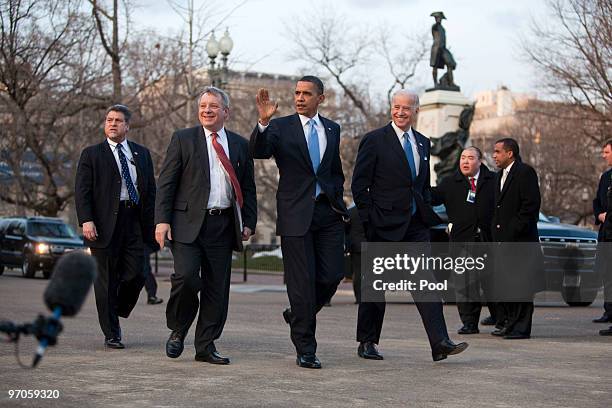 President Barack Obama walks with Senate Majority Whip Richard Durbin and Vice President Joseph Biden as they return to the White House after hosting...