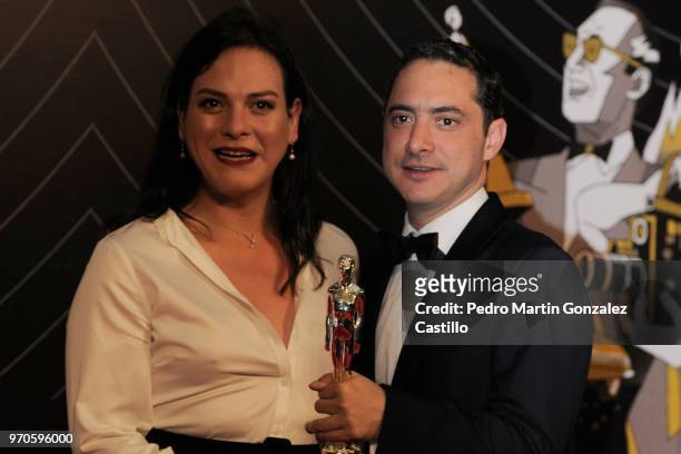 Chilean actress Daniela Vega and producer Juan de Dios Larraín, pose with the Ariel Award after winning Best Iberoamerican Movie for 'A fantastic...