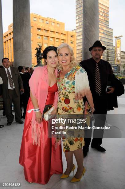 Mexican actress Arcelia Ramírez and TV producer Carla Estrada pose during the Red Carpet of 60th Ariel Awards at Palacio de Bellas Artes on June 5,...