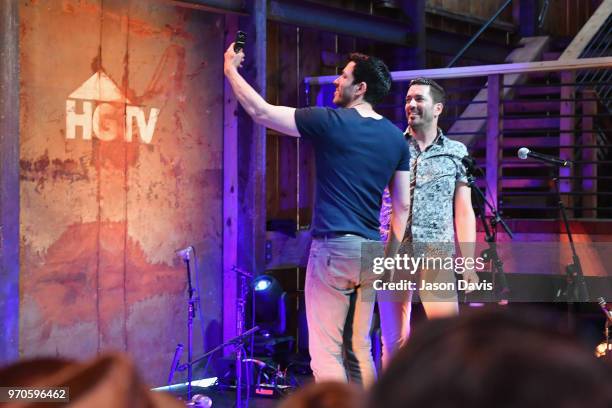 The Property Brothers Drew Scott and Jonathan Scott speak onstage in the HGTV Lodge at CMA Music Fest on June 9, 2018 in Nashville, Tennessee.