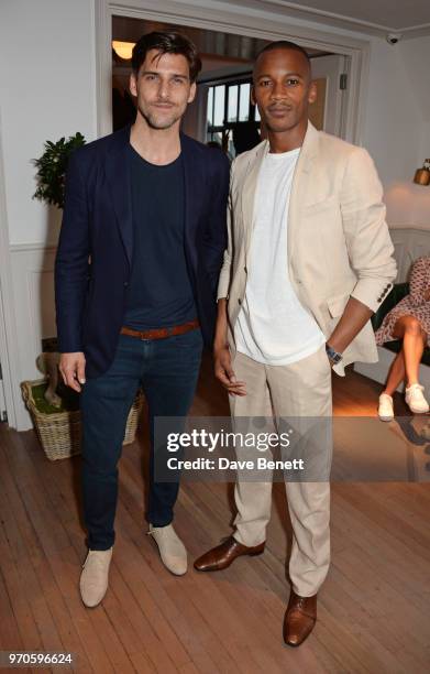 Johannes Huebl and Eric Underwood attend the London Fashion Week Men's cocktail party with DANIEL w. FLETCHER and Christian Louboutin at Mortimer...