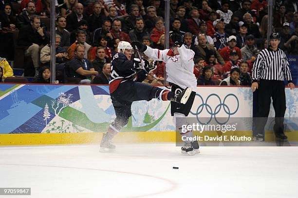 Winter Olympics: USA Paul Stastny in action vs Switzerland Mathias Seger during Men's Playoffs Quarterfinals - Game 23 at Canada Hockey Place....