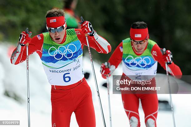 Bill Demong and Johnny Spillane of the US compete in the men's Nordic Combined Cross Country at Whistler Olympic Park during the Vancouver Winter...