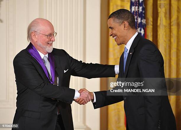President Barack Obama presents the 2009 National Medal of Arts to composer John Williams during a ceremony February 25, 2010 in the East Room of the...