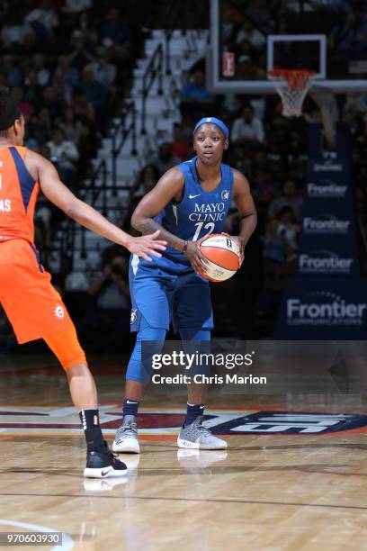 Alexis Jones of the Minnesota Lynx handles the ball against the Connecticut Sun on June 9, 2018 at the Mohegan Sun Arena in Uncasville, Connecticut....