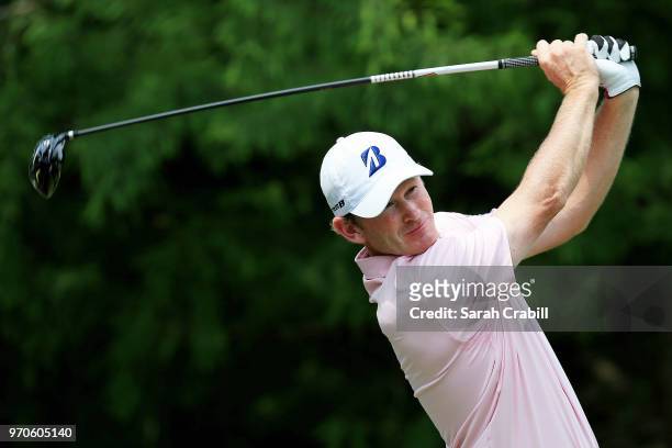 Brandt Snedeker plays his shot from the 12th tee during the third round of the FedEx St. Jude Classic at TPC Southwind on June 9, 2018 in Memphis,...
