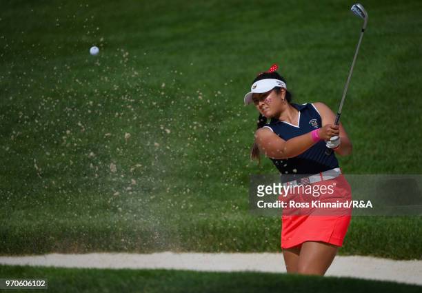 Lilia Vu of the United States team plays her second shot from a bunker on the fifth hole in her match with Jennifer Kupcho against Olivia Mehaffey...