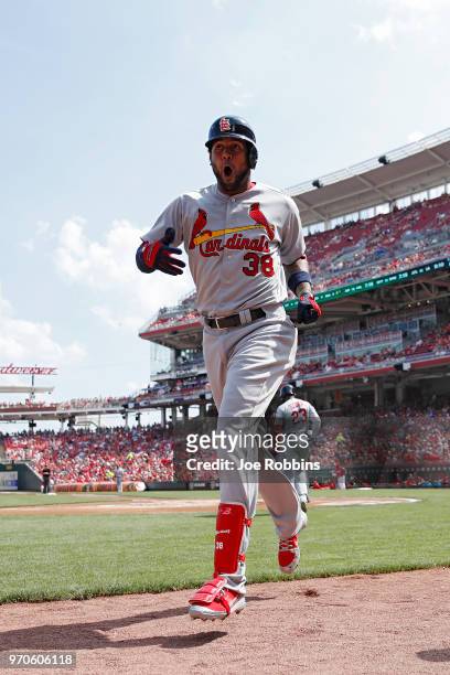 Jose Martinez of the St. Louis Cardinals reacts after hitting a solo home run in the first inning against the Cincinnati Reds at Great American Ball...