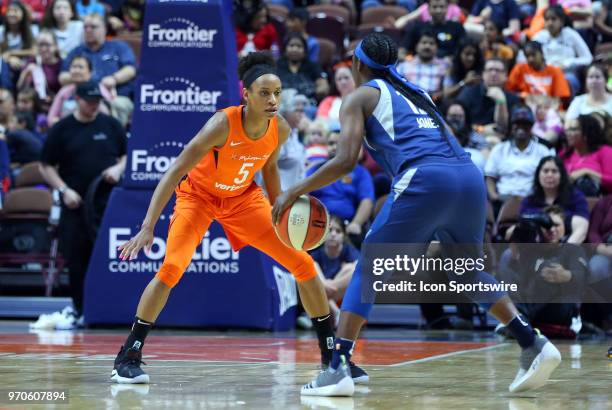 Connecticut Sun guard Jasmine Thomas defends Minnesota Lynx guard Alexis Jones during a WNBA game between Minnesota Lynx and Connecticut Sun on June...