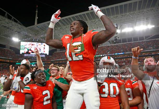 Miami defensive back Malek Young wears the turnover chain after intercepting against Notre Dame at Hard Rock Stadium in Miami on November 11, 2017.