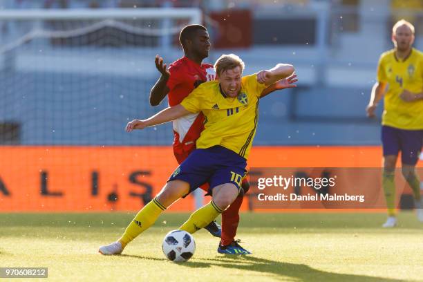 Emil Forsberg and Christian Ramos battle for the ball during the international friendly match between Sweden v Peru at the Ullevi Stadium on June 9,...