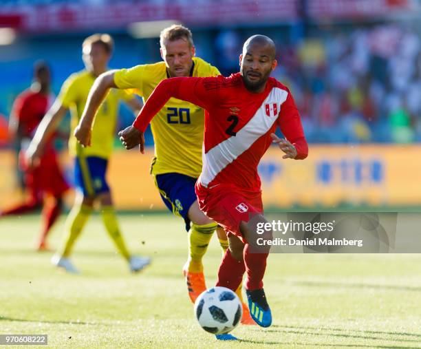 Alberto Rodriguez of Peru and Ola Toivonen of Sweden battle for the ball during the international friendly match between Sweden v Peru at the Ullevi...