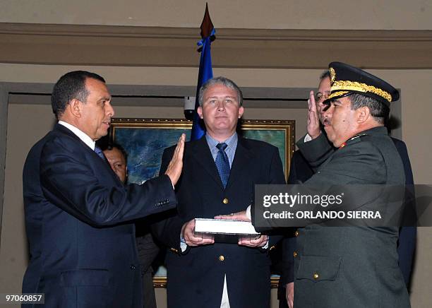 Honduran general Carlos Cuellar swears in as Chief of Staff of the Honduran Armed Forces to Honduran President Porfirio Lobo , in front of the...