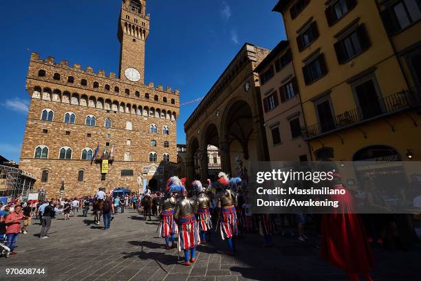 Men in traditional dress march through Florence ahead of the Calcio Storico Fiorentino 2018 semi-final match between the Santa Maria Novella Team and...