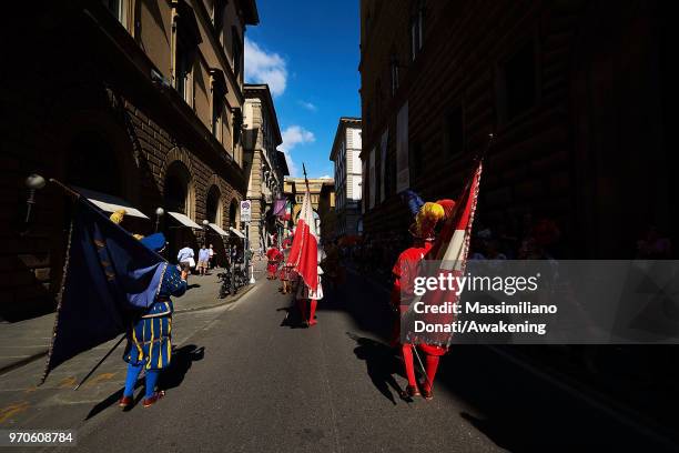 Men in traditional dress march through Florence ahead of the Calcio Storico Fiorentino 2018 semi-final match between the Santa Maria Novella Team and...