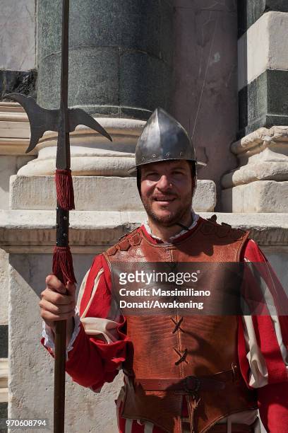 Man in traditional dress march through Florence ahead of the Calcio Storico Fiorentino 2018 semi-final match between the Santa Maria Novella Team and...