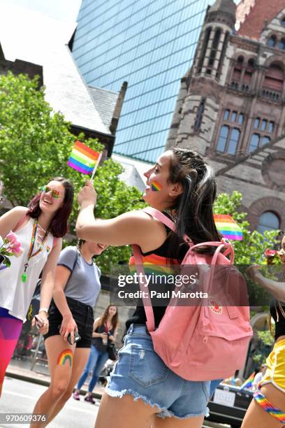 Young people dance on Boylston Street prior to the start of the 48th annual Boston Pride Parade on June 9, 2018 in Boston, Massachusetts.