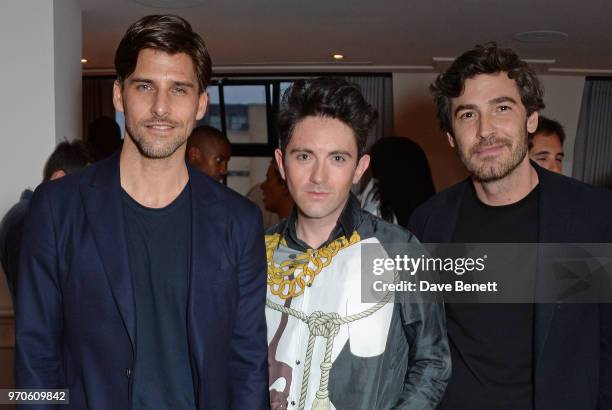 Johannes Huebl, Daniel W. Fletcher and Robert Konjic attend the London Fashion Week Men's cocktail party with DANIEL w. FLETCHER and Christian...