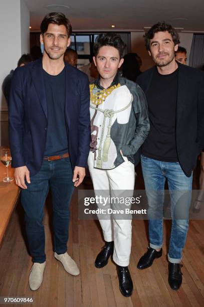 Johannes Huebl, Daniel W. Fletcher and Robert Konjic attend the London Fashion Week Men's cocktail party with DANIEL w. FLETCHER and Christian...