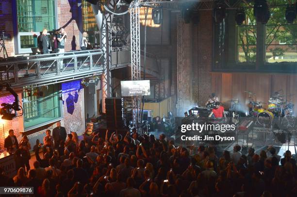 Dan Smith performs from the balcony during BRIT Award-winning rock band Bastille's performance exclusively for Hilton Honors members at LSO St Lukes...