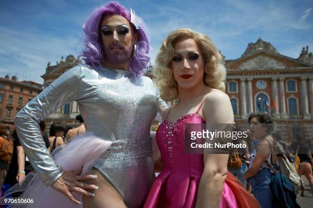 About 30.000 people took to the streets of Toulouse for the annual pride march. A couple of queer pose for a picture in front of the cityhall of...