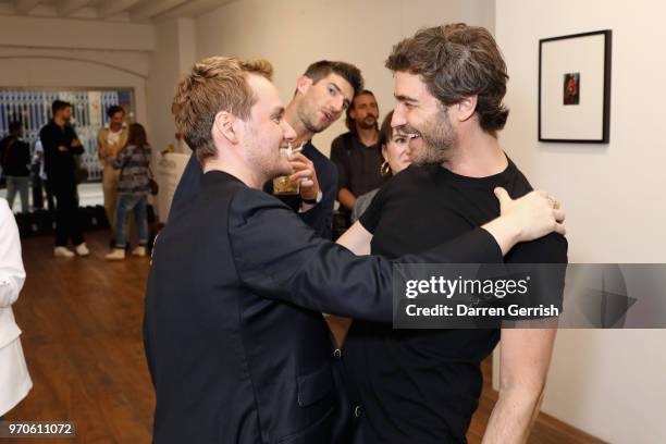 Jonathan Daniel Pryce and Robert Konjic attend as Vogue Hommes Presents GarconJon 10 Years Of Street Style at 13 Floral Street on June 9, 2018 in...