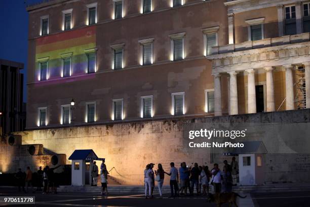 The rainbow flag is projected to the Greek Parliament during Athens Pride 2018. Thousands of people march in the streets of city center during the...