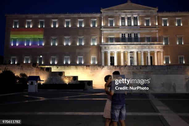 The rainbow flag is projected to the Greek Parliament during Athens Pride 2018. Thousands of people march in the streets of city center during the...