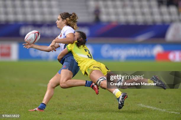 Marjorie Mayans of France is tackled during match between Australia and France at the HSBC Paris Sevens, stage of the Rugby Sevens World Series at...