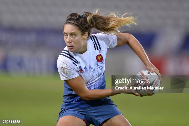 Marjorie Mayans of France passes the ball during match between Australia and France at the HSBC Paris Sevens, stage of the Rugby Sevens World Series...